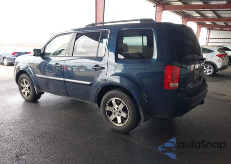 2010 Honda Pilot Touring z USA, uszkodzony, nr VIN 5FNYF4H95AB013759